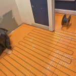 Schluter Ditra uncoupling membrane installed for a heated tile floor