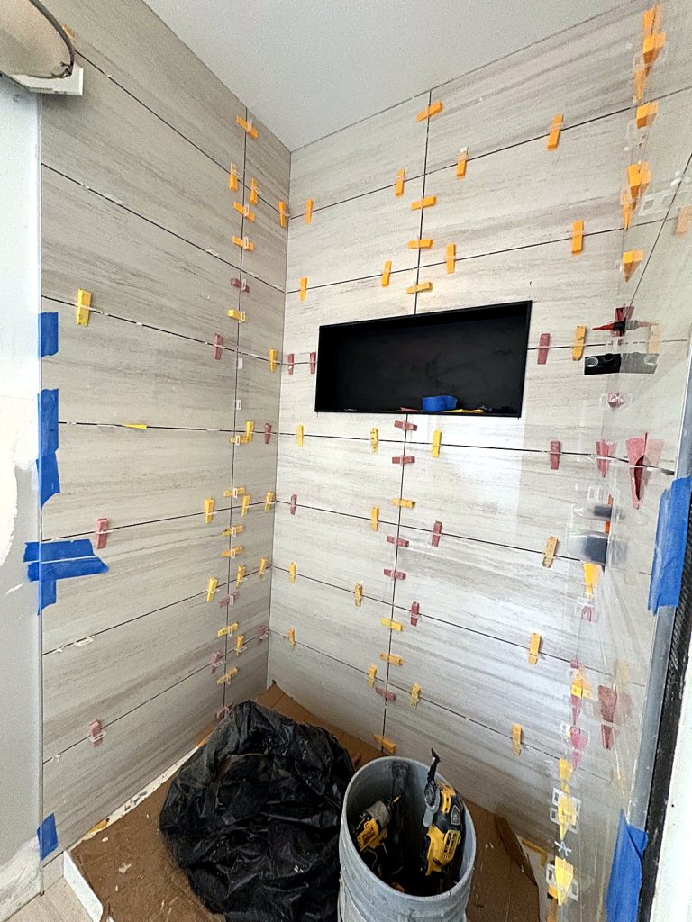 Large format tile installation with leveling system Surrey BC