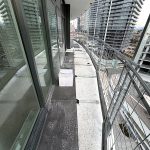 Large format tile installation on curved balcony Burnaby BC
