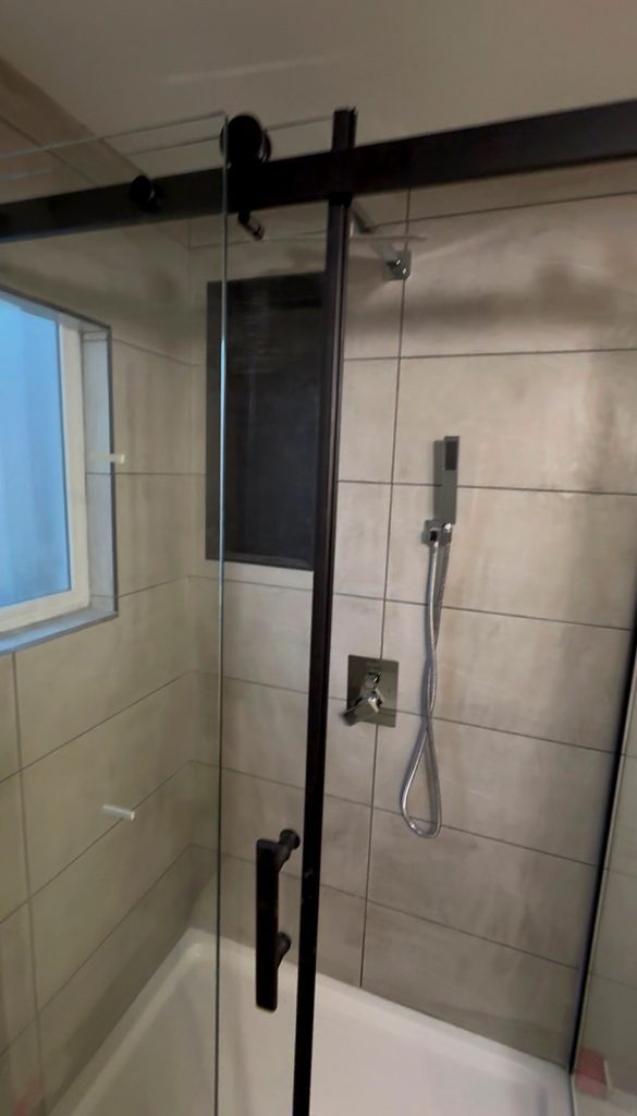 Finished walk-in shower with glass door Vancouver bathroom renovation