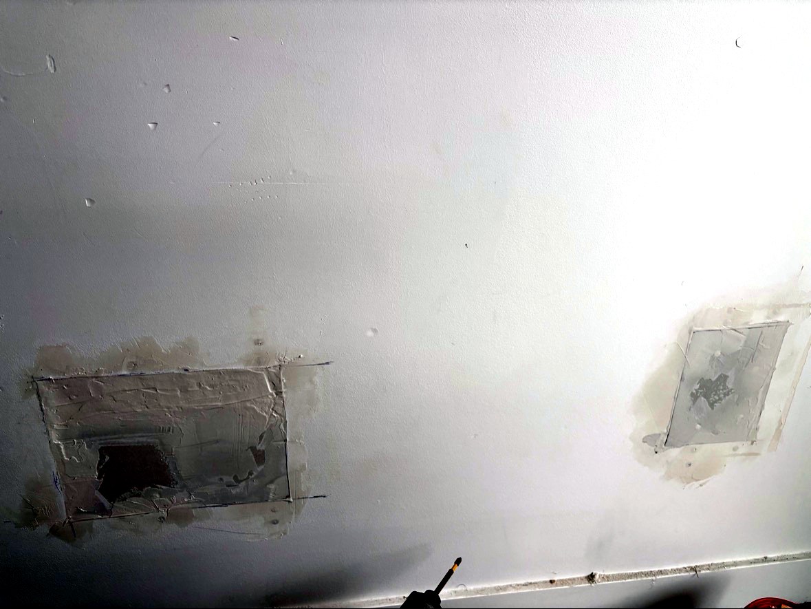 Joint compound applied over drywall patch seams