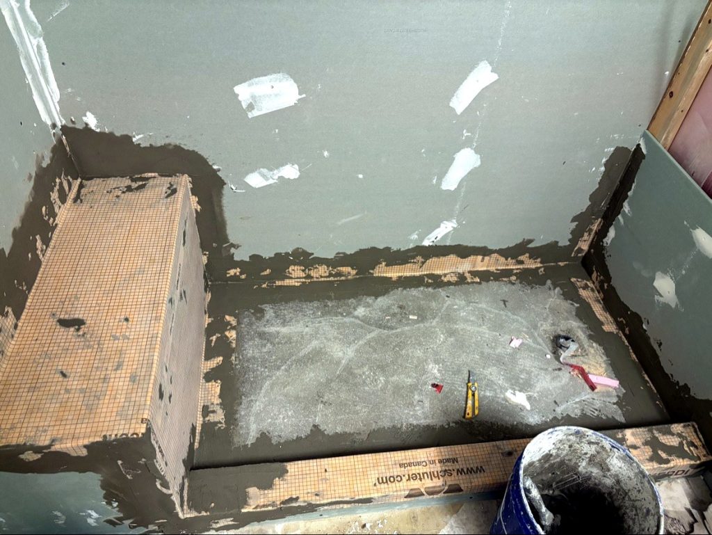 Waterproof membrane applied to shower walls Langley