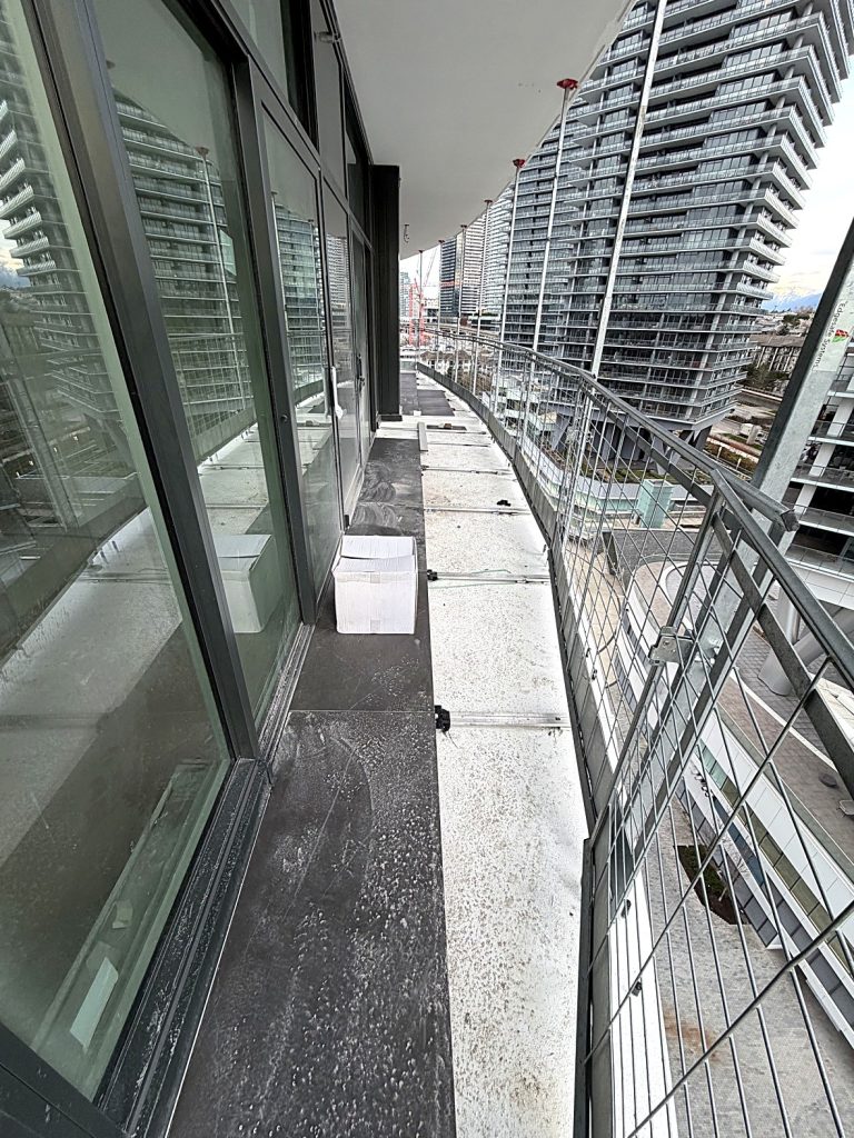 Large format porcelain paver installation on Burnaby balcony