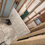 Shower pan framing and plumbing rough-in