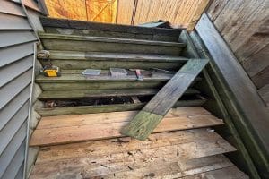 Rotten wooden outdoor stairs in Vancouver before full replacement