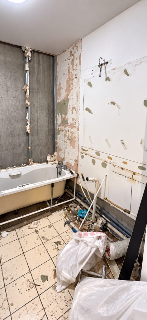 Bathroom during demolition before tub-to-shower conversion, Richmond BC